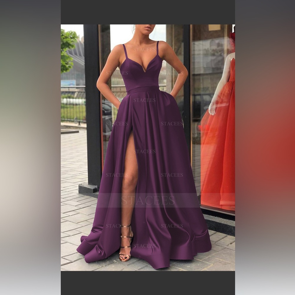 Plum gown, never worn brand new! WITH TAGS!